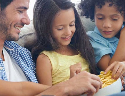 Family enjoying popcorn
