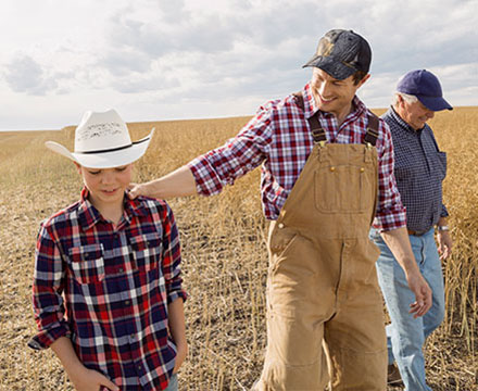 Regenerative Agriculture farmer family in field image Regenerative Agriculture farmer family in field image