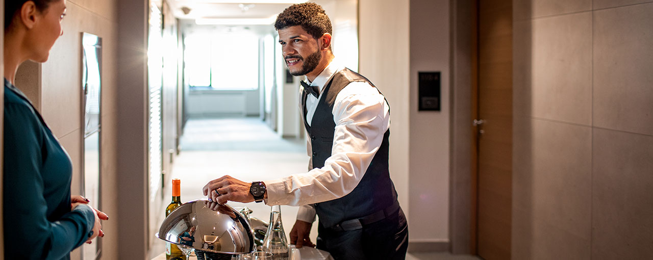 Waiter Doing Room Service