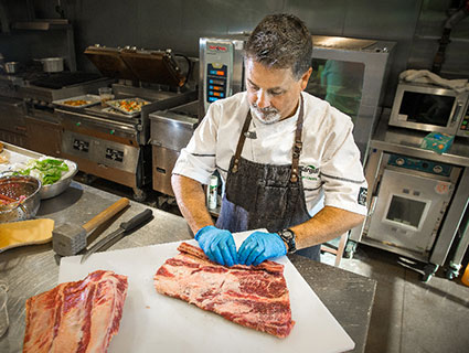 Chef Preparing Meat