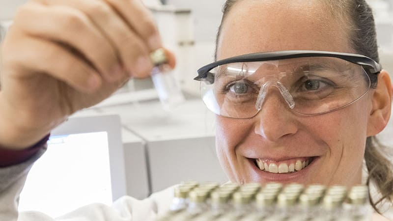 Female scientist examines samples of ingredients for cooking oils at Izgem, Belgium facility GEOS Female scientist examines samples of ingredients for cooking oils at Izgem, Belgium facility GEOS