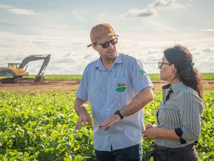 people at a farm walking image