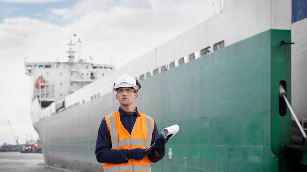Ocean transportation ship man in front image