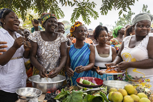 Woman in cocoa community smiling image
