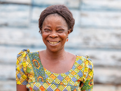Woman in cocoa community smiling image