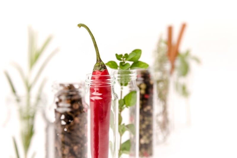 herbs and spices in small jars