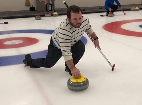 Patrick trying ice curling