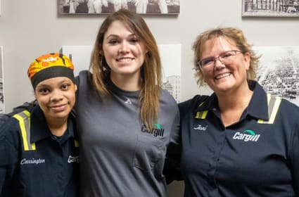 Cargill employees pose in custom-made uniforms 