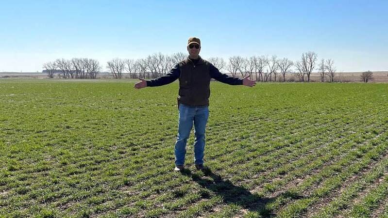Todd Dzingle on his farmland in Nebraska image
