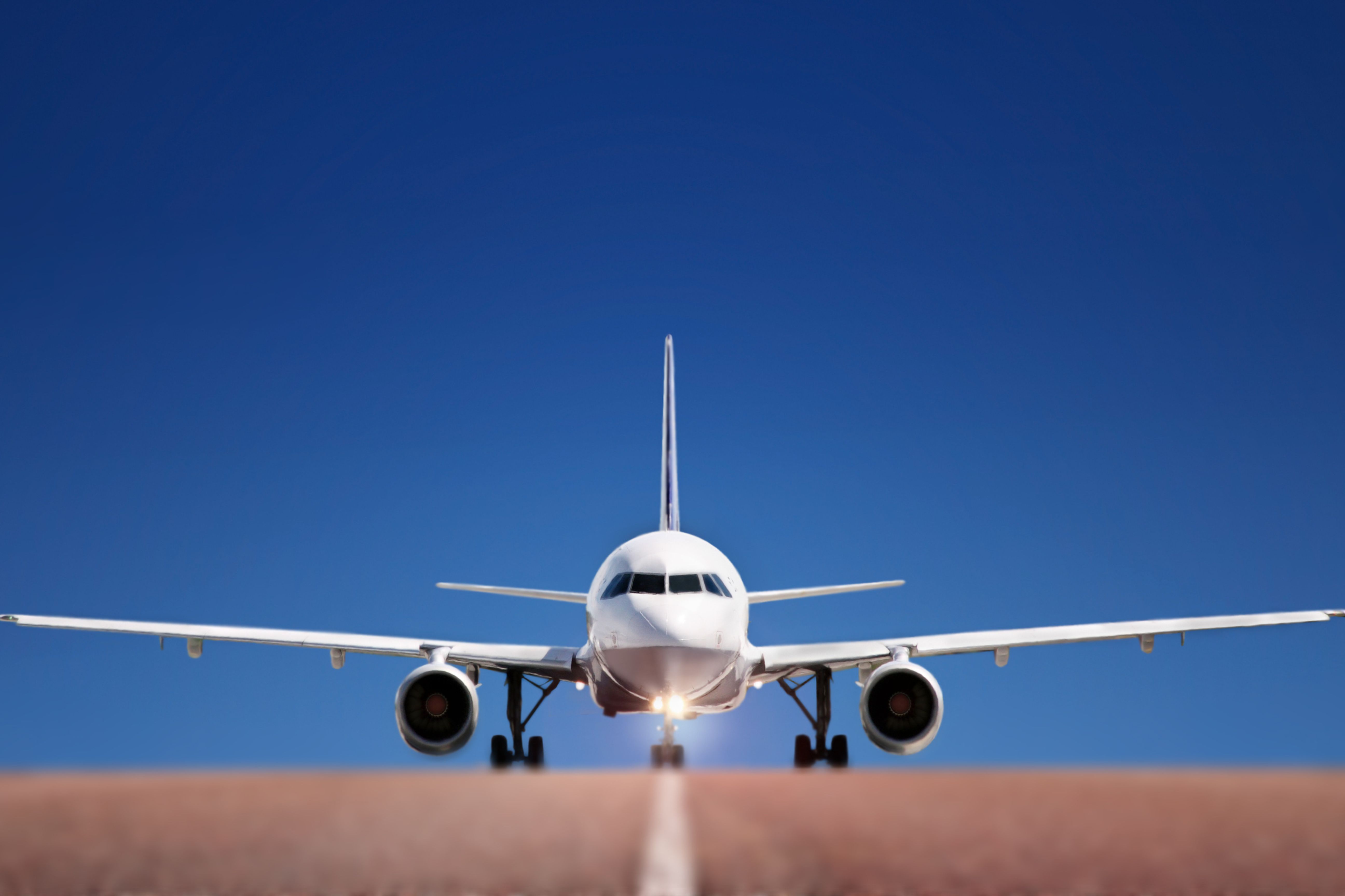 Boeing airplane on airport runway