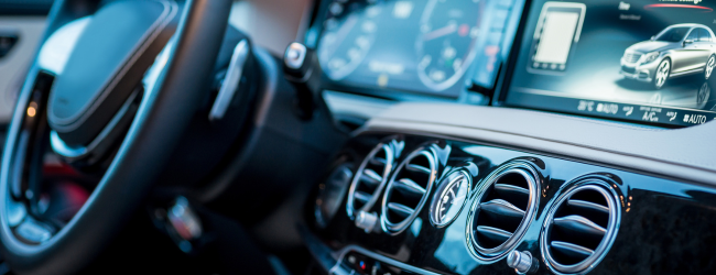 Luxury car steering wheel and dashboard