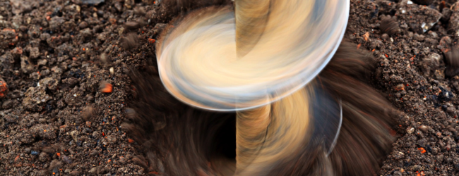 drilling into the dirt