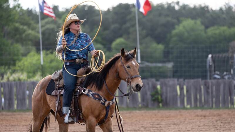 Lariat Adams riding a horse