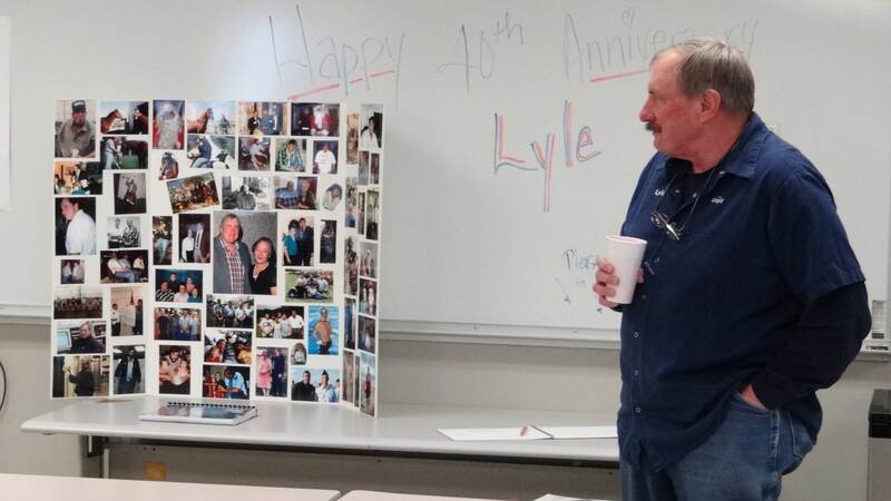 Cargill employee with a work anniversary cake. Cargill employee with a work anniversary cake.