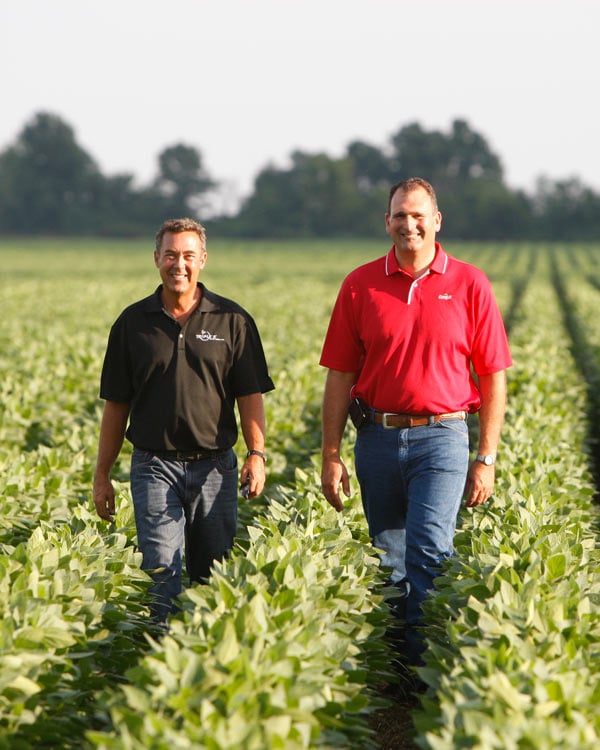 men walking in a field image men walking in a field image