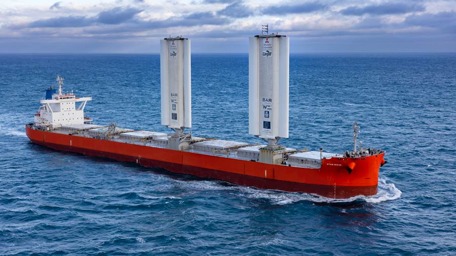 A ship using wind-assisted propulsion on the sea. A ship using wind-assisted propulsion on the sea.