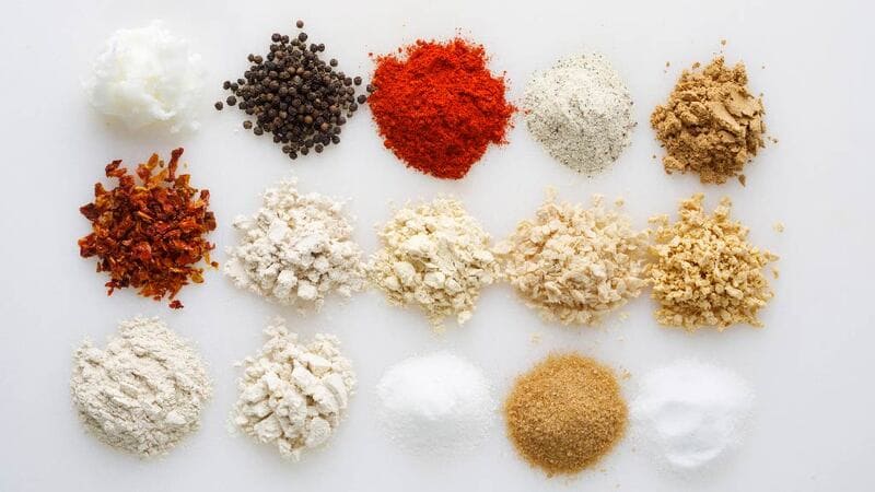 Piles of ingredients that help form a plant-based burger. Piles of ingredients that help form a plant-based burger.