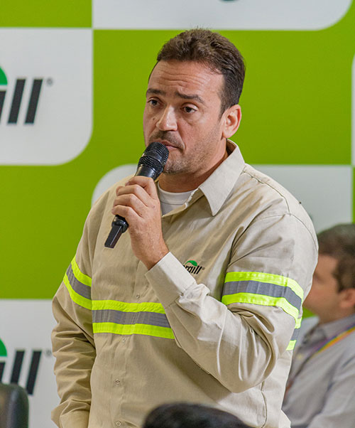 A man on a microphone. 