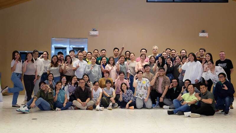 Mark Eugene with some of his 1,000 team members at our Calabarzon plant, in the Philippines.