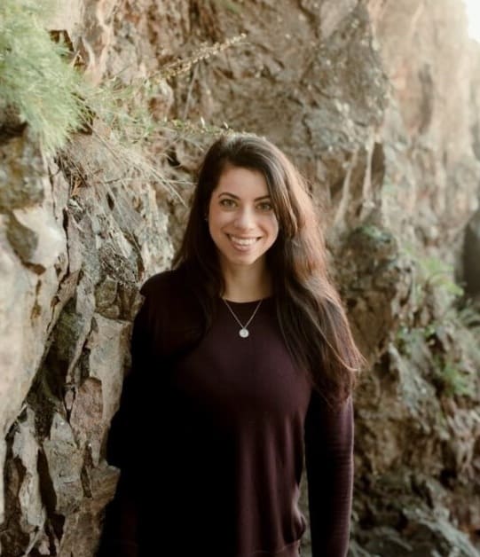 Bethany May stands along a cliff at the North Shore of Minnesota.