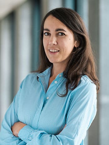 A woman smiles at the camera during a Cargill event for women traders. A woman smiles at the camera during a Cargill event for women traders.