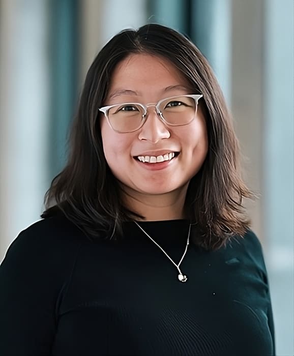 A woman in a black shirt smiles at the camera during a recent Cargill event for women in trading. A woman in a black shirt smiles at the camera during a recent Cargill event for women in trading.