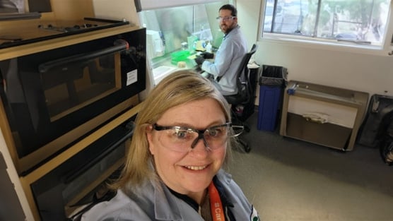 Cargill biochemist Keith Brady looks up from his work on yeast strains at Cargill’s Minneapolis R&D Center with Erin Marasco. 