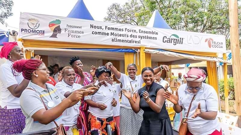 A group of women celebrating and clapping together. A group of women celebrating and clapping together.
