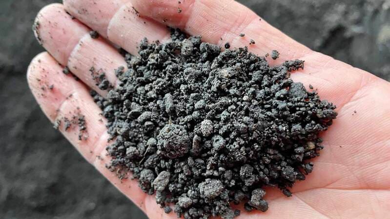 A farmer flies a drone on a cattle feedlot in Brazil.