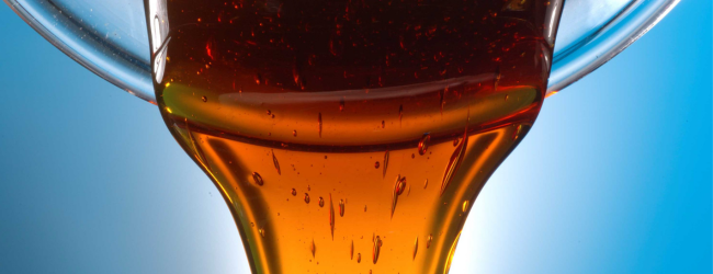 pouring dark oil