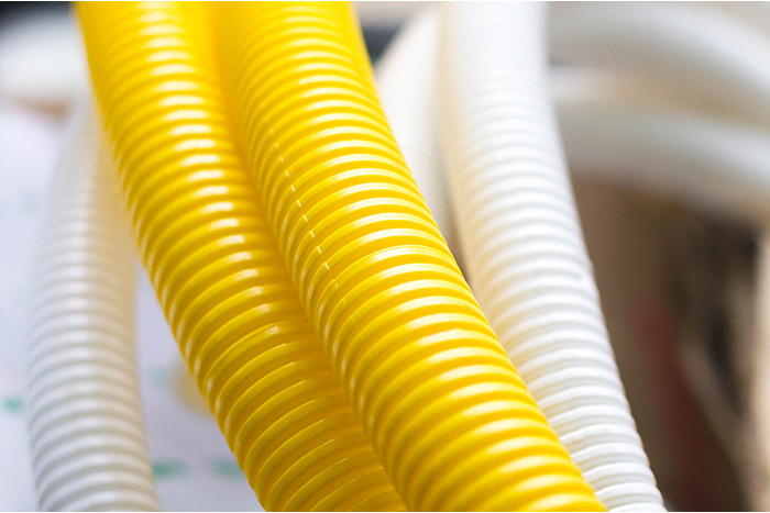yellow plastic flexible hoses_plasticization
