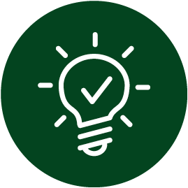 green circle with white light bulb 