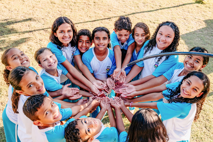 School children from São Desiderio in Brazil enjoying clean water School children from São Desiderio in Brazil enjoying clean water