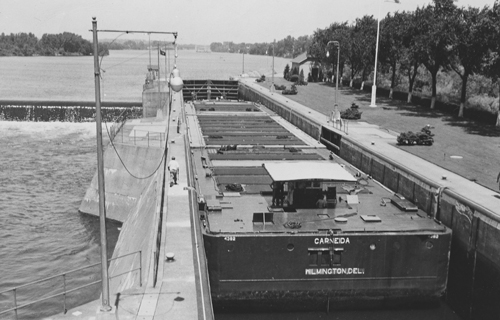 Cargill’s Carneida ship floats in a lock on a river. Cargill’s Carneida ship floats in a lock on a river.