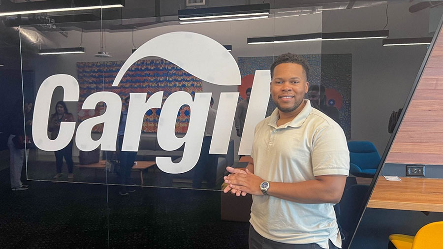 A Cargill data employee stands in front of a glass wall at the Atlanta office. A Cargill data employee stands in front of a glass wall at the Atlanta office.