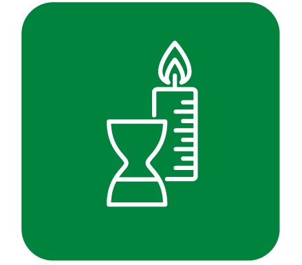 white outline of hourglass and candle in green square