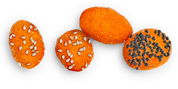 Coated salt-reduced pumpkin seed snack