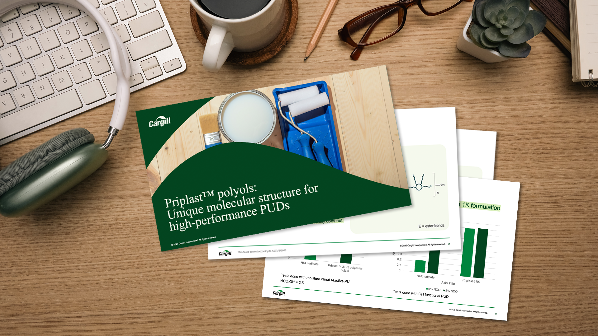 presentation pages spread on wooden desk