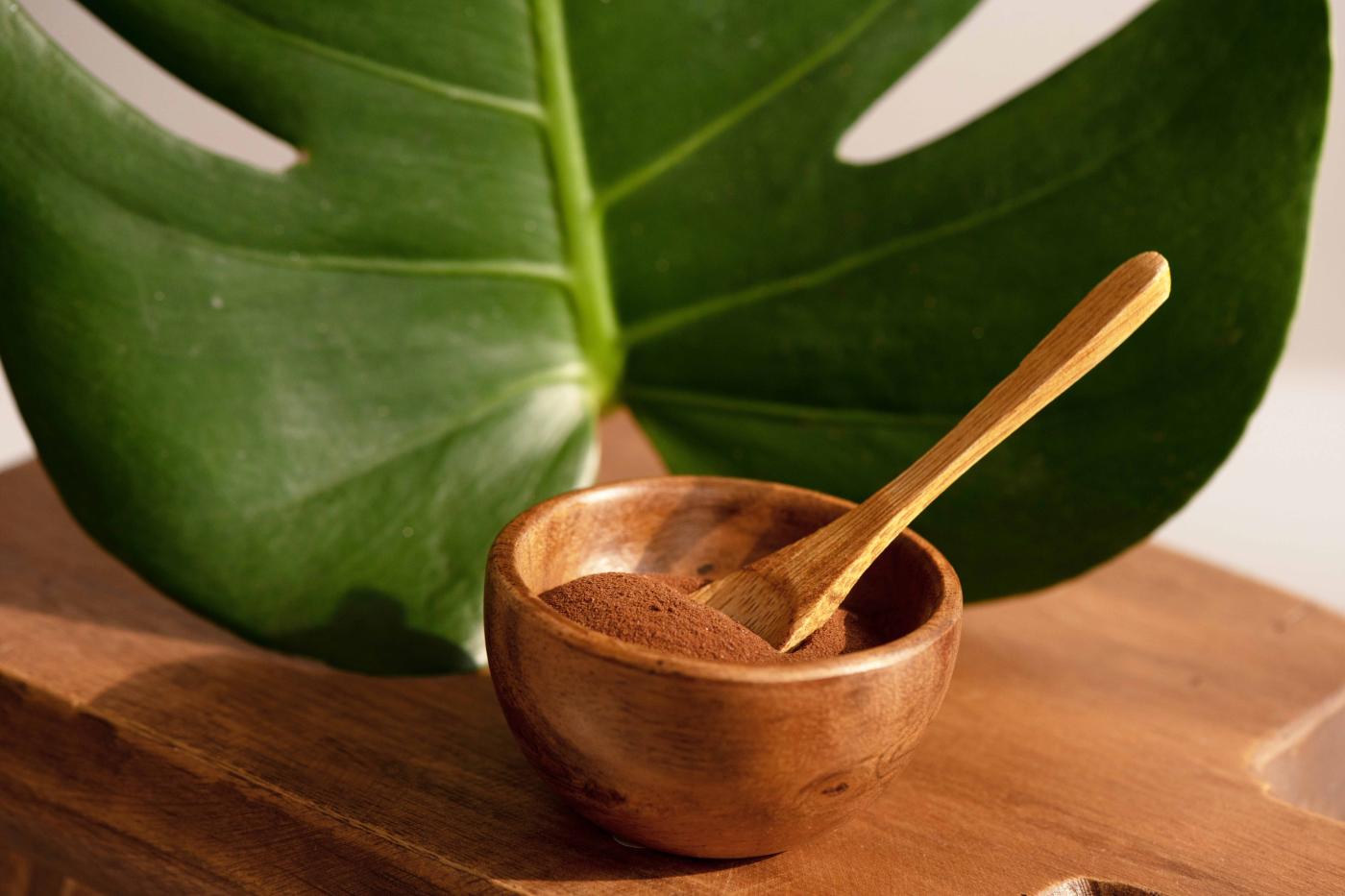 EpiCor® powder in a natural wooden bowl.